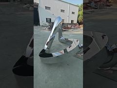 This abstract streamlined stainless steel sculpture adopts top-level mirror polishing